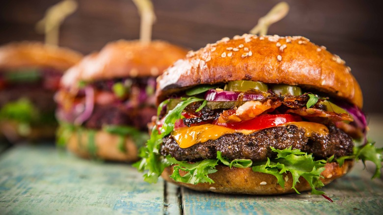 Burger stacked with toppings