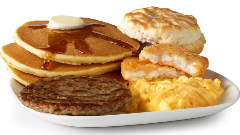 A McDonald's Big Breakfast with Pancakes against a white background