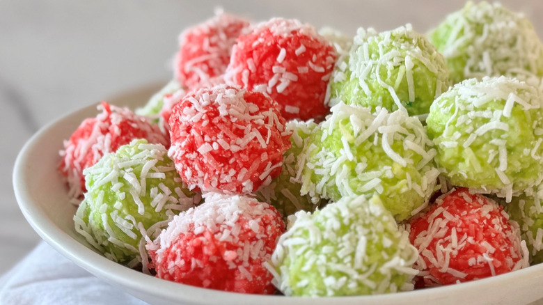 Red and green Jell-O balls in bowl
