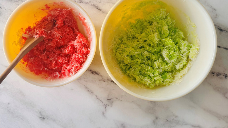 Bowls of red and green coconut Jell-O mixtures