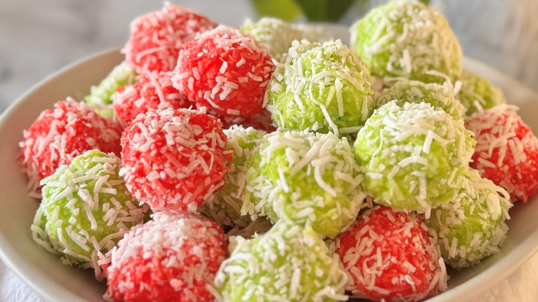 Red and green Jell-O balls in bowl