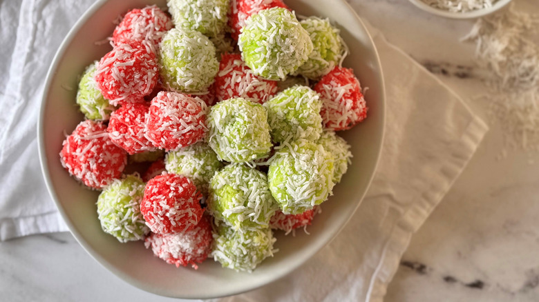 Red and green Jell-O balls in bowl
