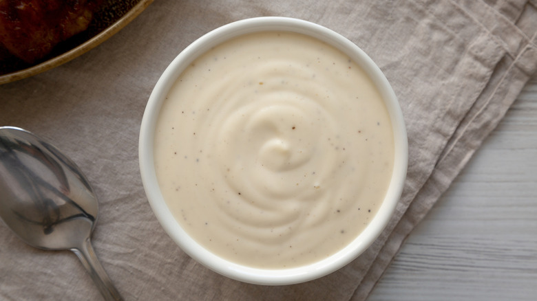 A bowl of Alabama white barbecue sauce