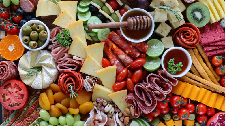 two salami ribbons on charcuterie board