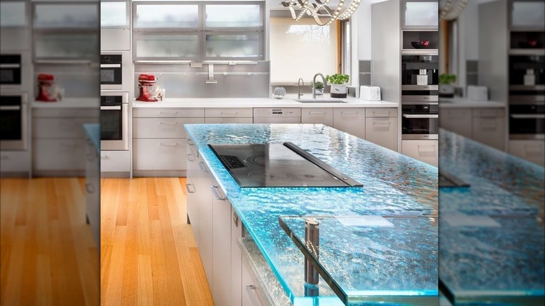 A glass countertop in a modern kitchen