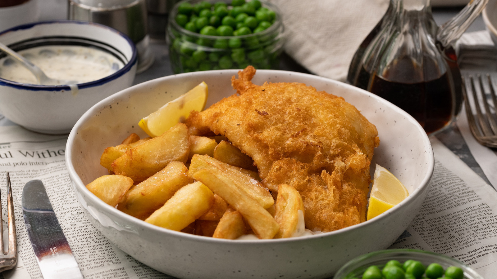 https://www.foodrepublic.com/img/gallery/golden-beer-battered-fish-and-chips-recipe/l-intro-1684172569.jpg