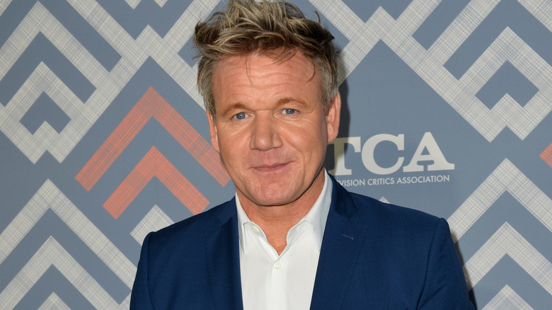 Gordon Ramsay smiling on red carpet