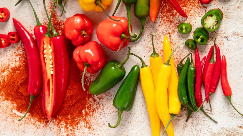 Variety of chile peppers on table
