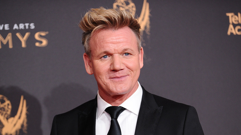 Chef Gordon Ramsay at Grammy awards wearing black suit and tie