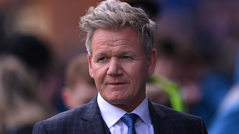 Gordon Ramsay wearing a suit and tie
