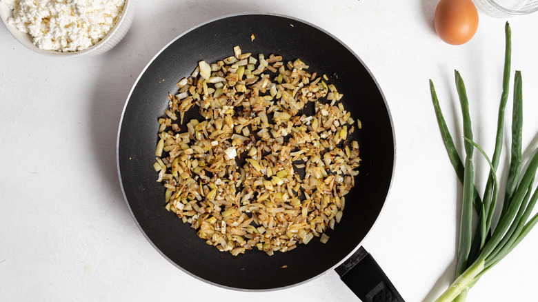 onion and garlic in pan
