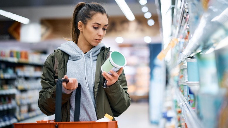 woman shopping for yogurt