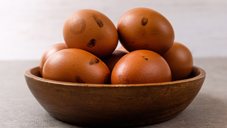 Smoked eggs in plate