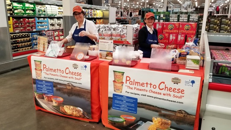 People handing out dip samples at Costco