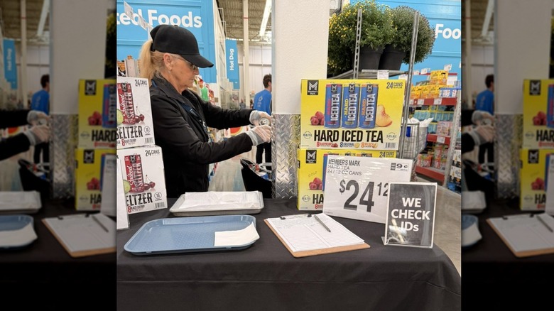 Sam's Club employee handing out samples of hard iced tea