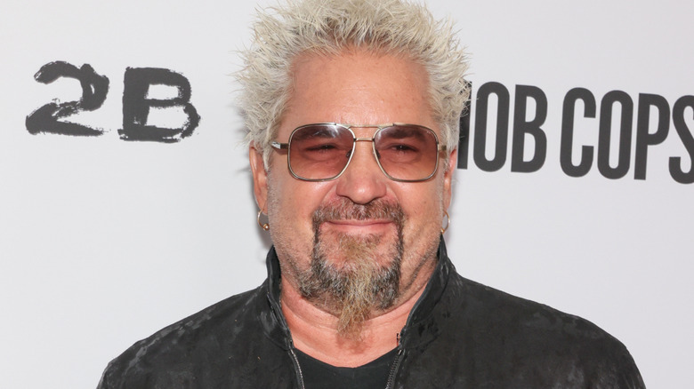 Closeup of Guy Fieri, smiling