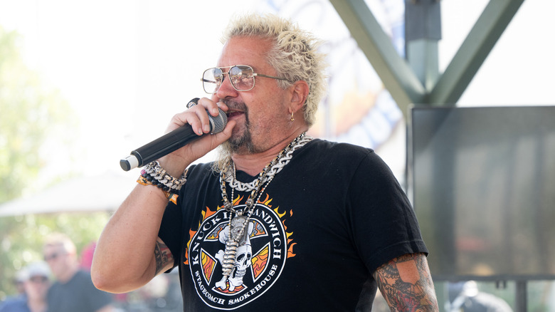 Guy Fieri speaking at an event in California