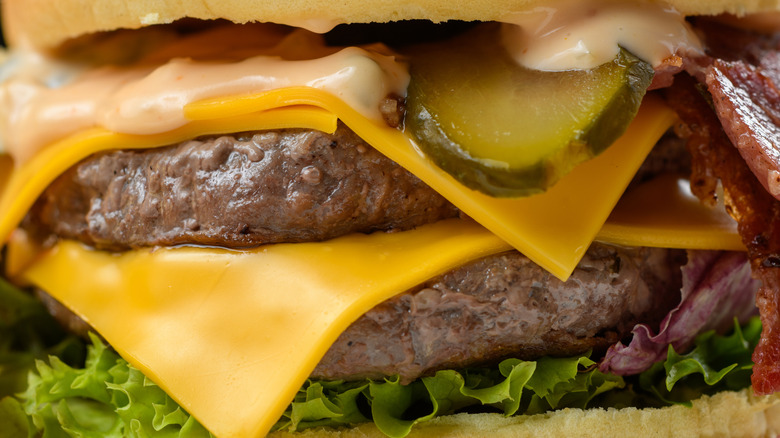 A close up of a fast food burger