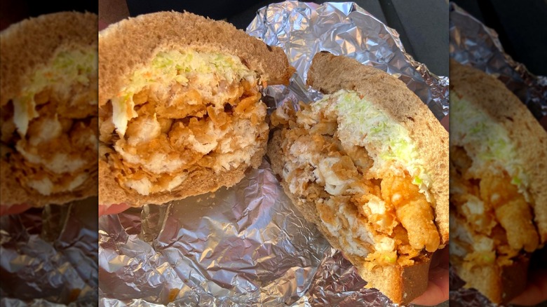 Art Mel's Spicy Dicy fried fish sandwich cut in half