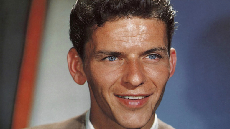 Color portrait of a young Frank Sinatra smiling