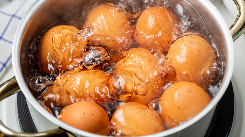 eggs boiling in pot