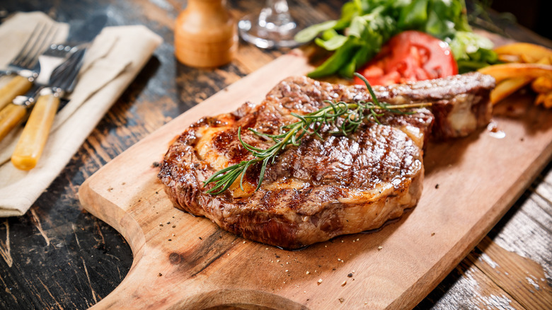 ribeye resting on cutting board