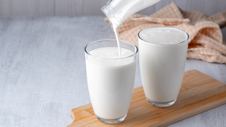 Buttermilk being poured into a glass