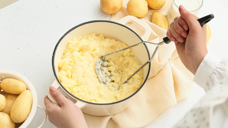 Mashing potatoes