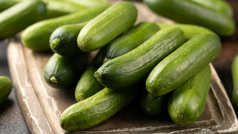 Cucumbers on a wooden board