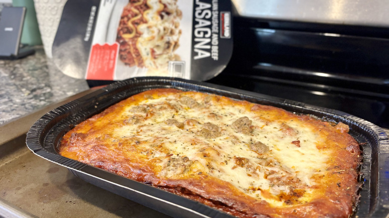 Costco's frozen lasagna sits freshly baked on tray on an oven