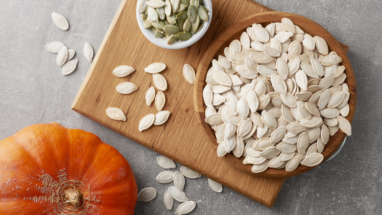 A bowl of pumpkin seeds.