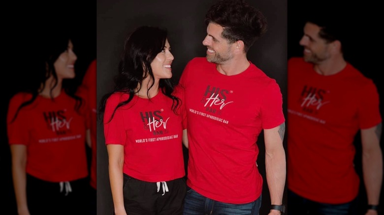 His & Her Bar founders wearing company merch
