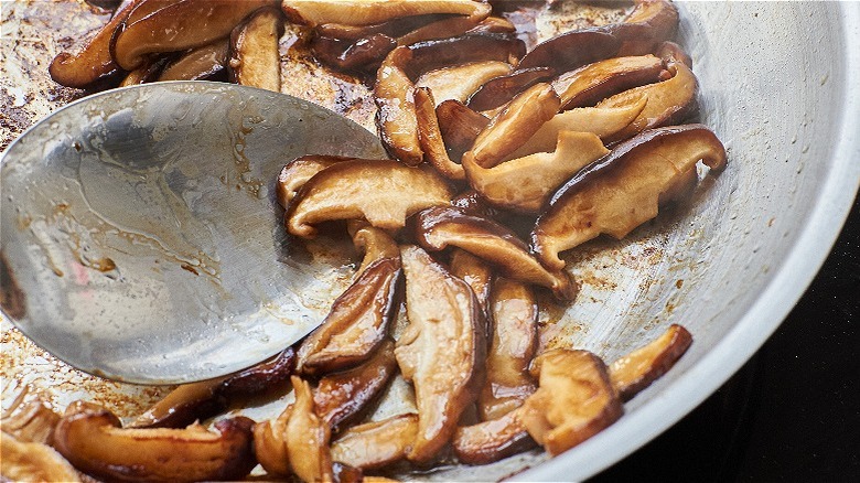 sauteeing shiitake mushrooms
