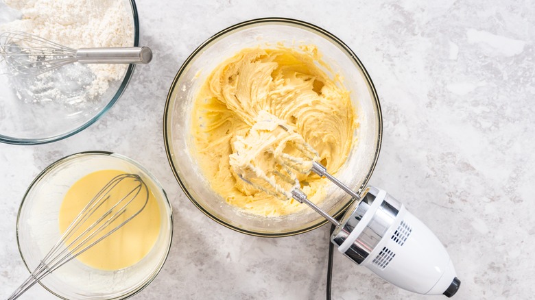 Overhead view of mixing bowl with cake mix