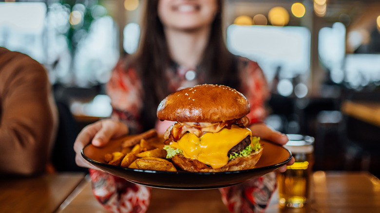 Cheeseburger with bacon and potato wedges