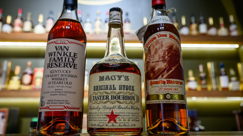A variety of different bourbon bottles.