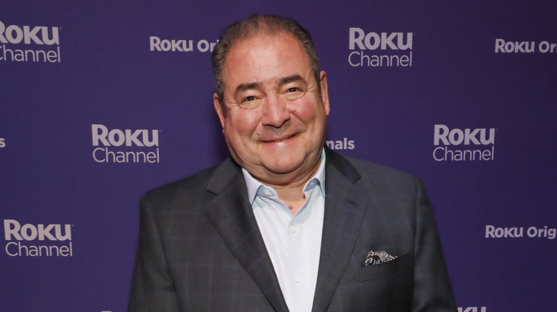 Emeril Lagasse smiling at an event