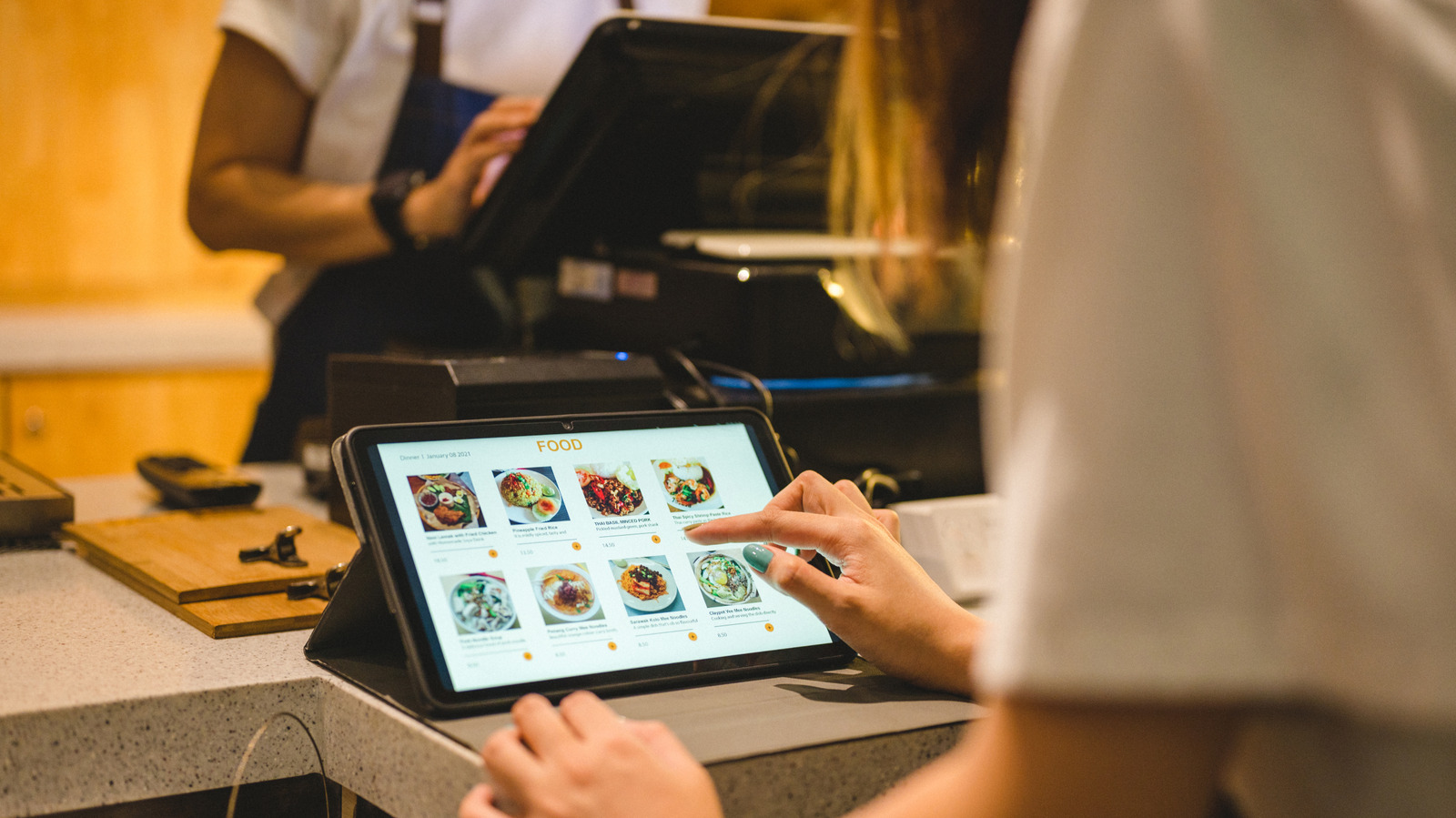 How Dining Kiosks And Service Tablets Trick Customers Into Paying More