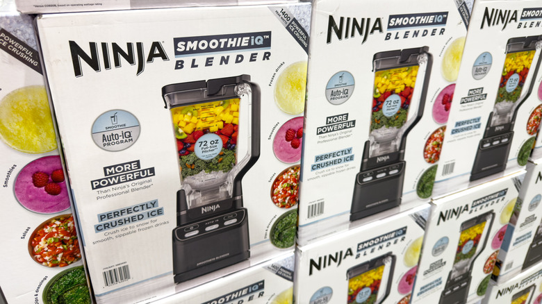 Boxes of the Ninga Smoothie iQ Blender are stacked in a retail store