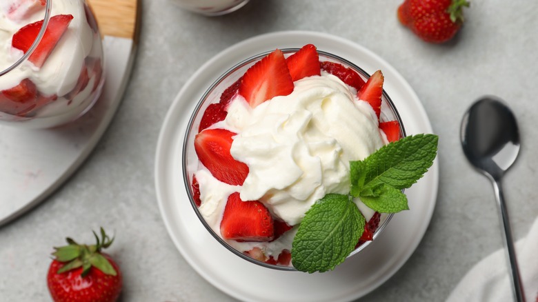 Whipped cream and fruit in a bowl