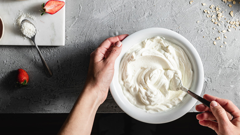 Overhead view of person making whipped cream
