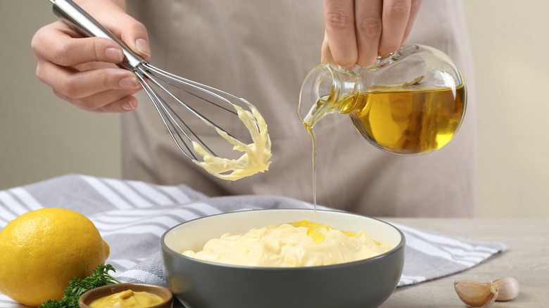Person making mayonnaise