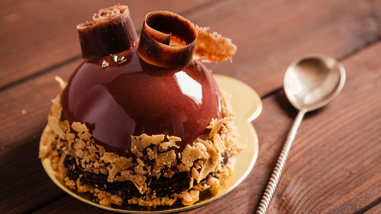 French chocolate mousse cake on wooden table