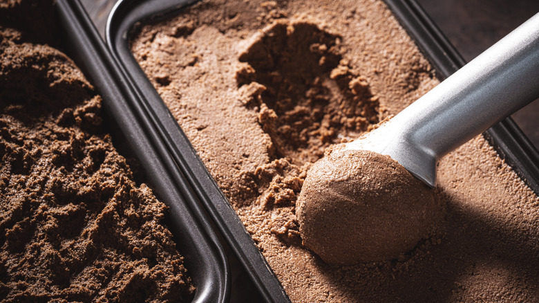 Chocolate ice cream being scooped