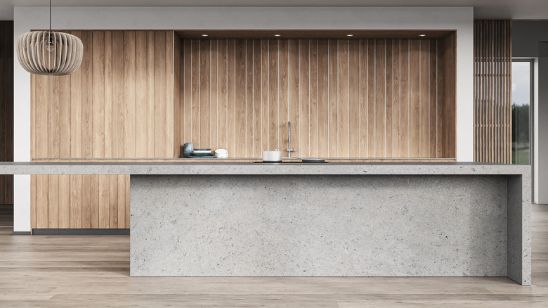 Kitchen with concrete island countertop