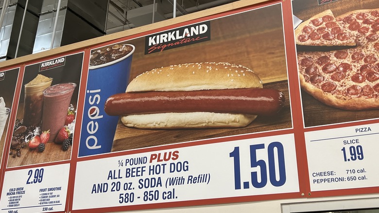 The menu board for the Costco food court can be seen, focused in on the hot dog combo