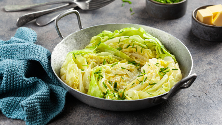 Stewed cabbage with butter and chives