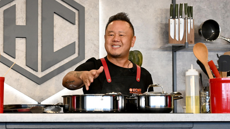 Jet Tila cooks on stage during the Food Network NYC Wine & Food Festival