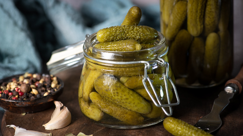 Open jar of pickles