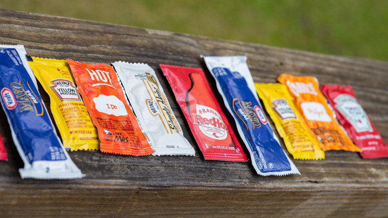 Line of condiment packets.
